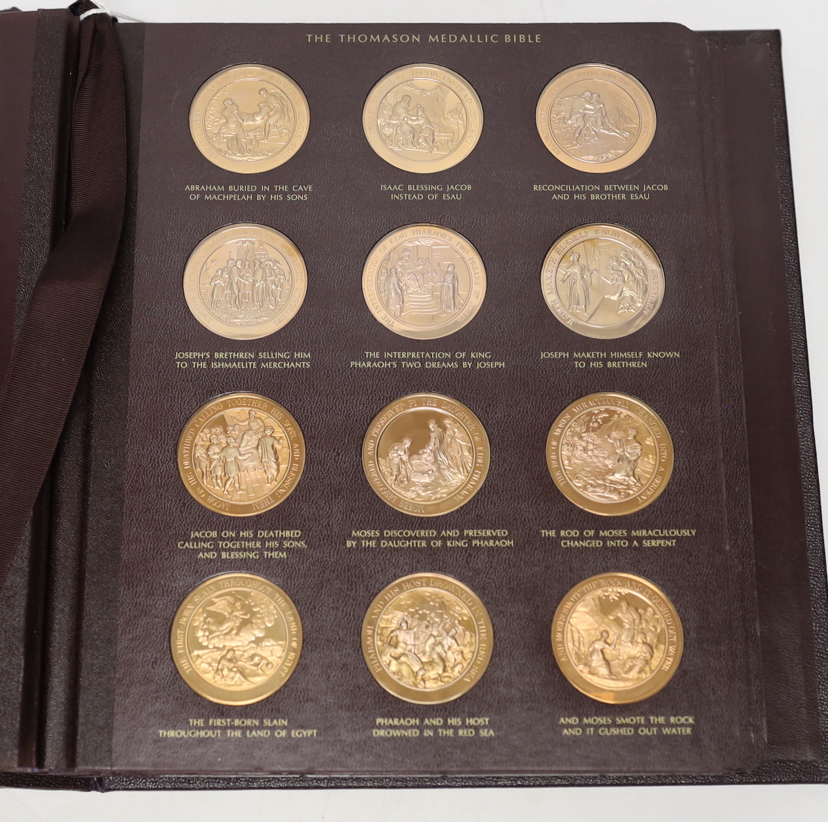 The Thomason Medallic Bible, Franklin mint version, sixty medals in a folder